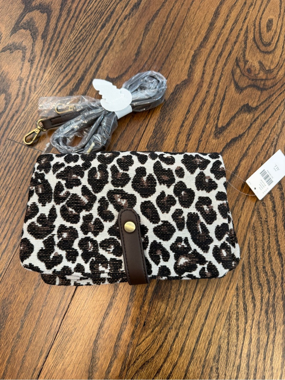 Anthropologie Black and White Leopard Crossbody with Brown Trim
